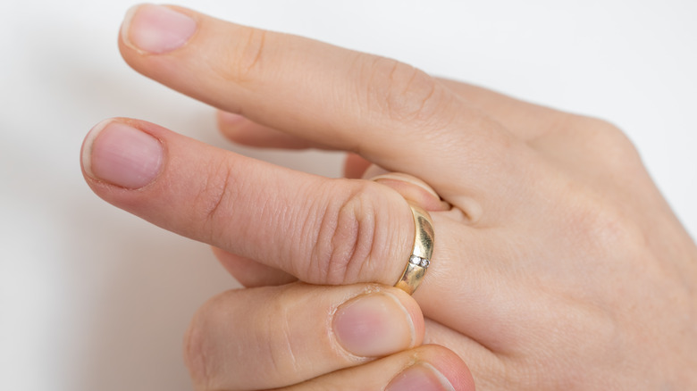 Person can't get ring off finger