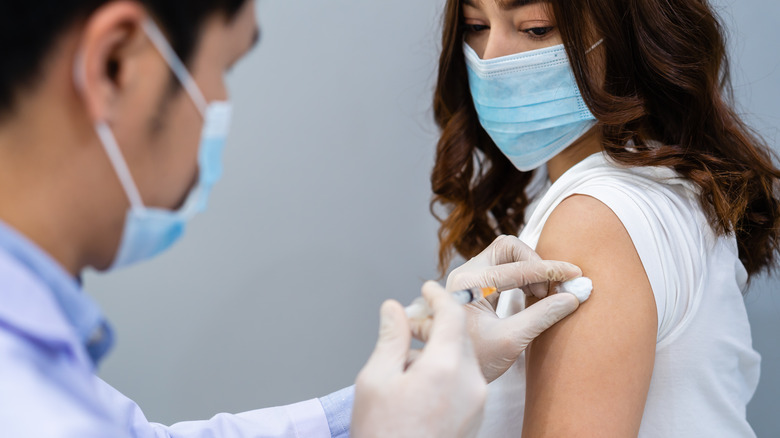 Woman getting vaccination