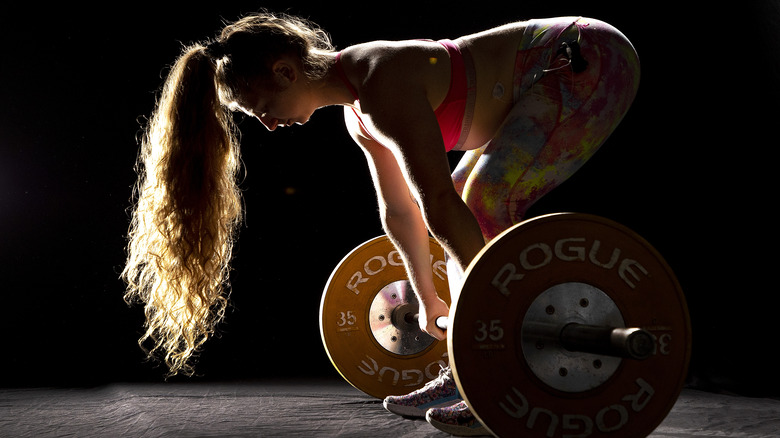 girl with rogue barbell