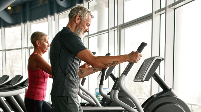 Older man working out at gym