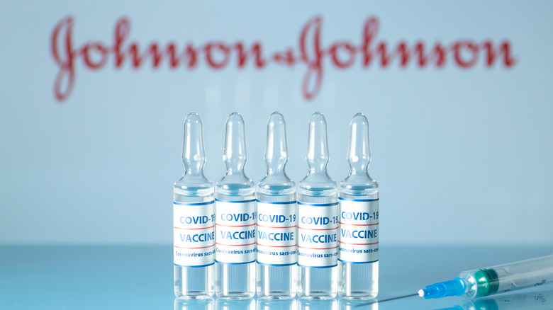 COVID-19 vaccine vials with Johnson and Johnson sign