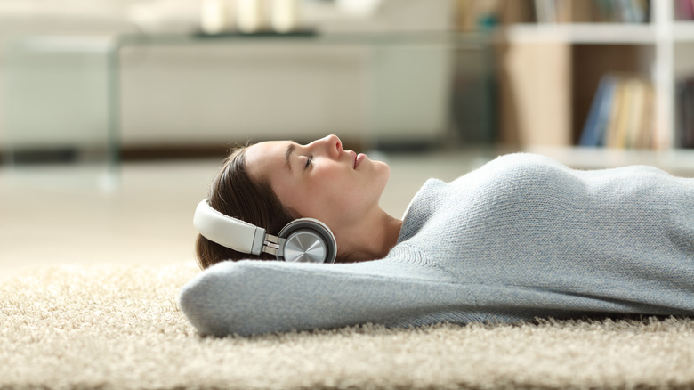 Woman relaxing listening to headphones
