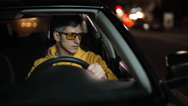 Man driving at night 