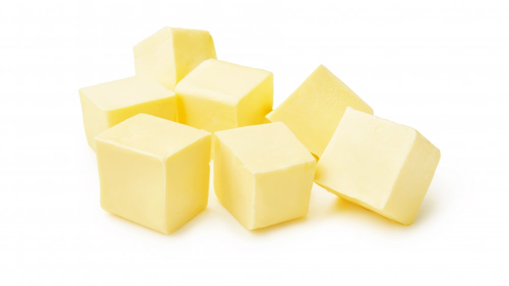 Cubes of butter on a white background