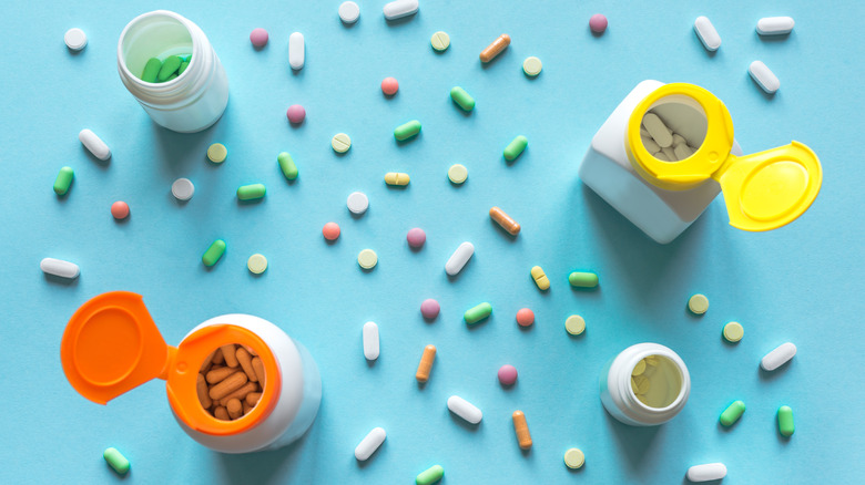assortment of pills and pill bottles