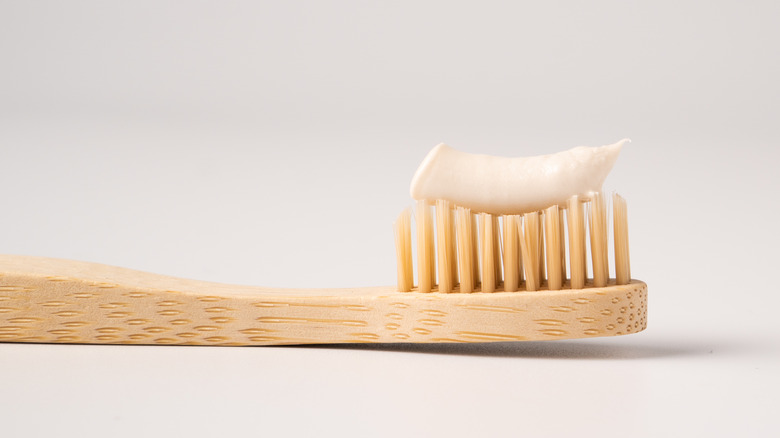 bamboo toothbrush on white background
