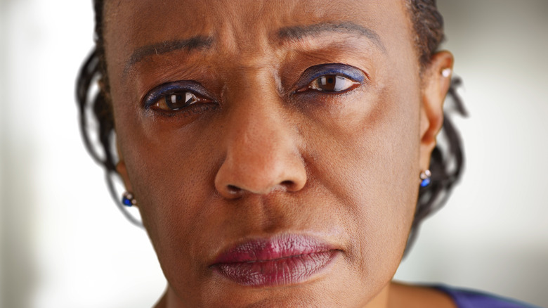older African American woman depressed