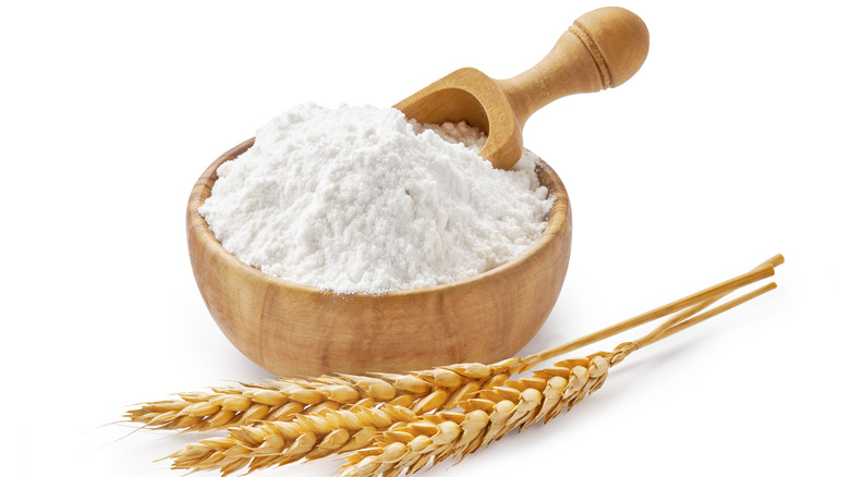 stalk of wheat with white flour