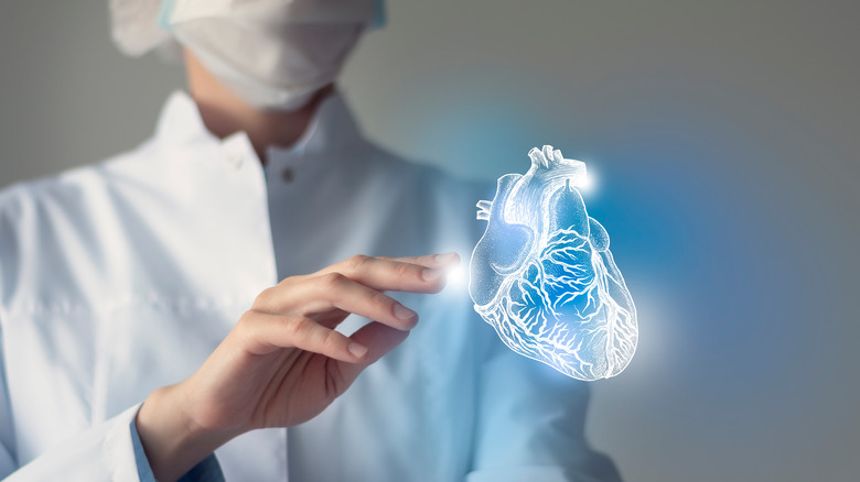 A doctor with a virtual heart concept