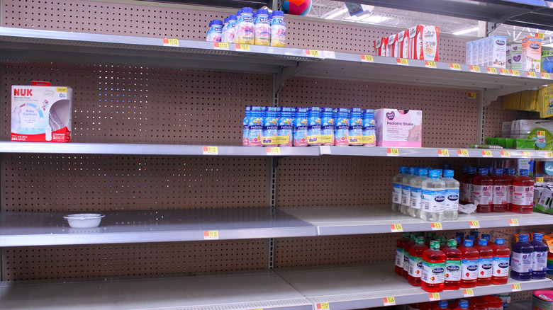 Empty shelves with baby formula 