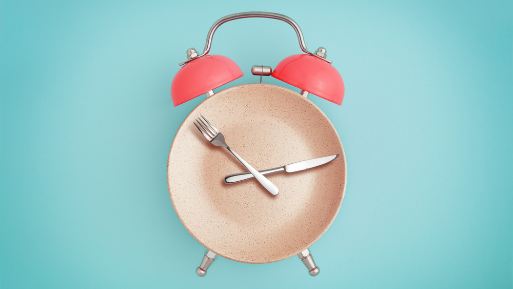 Alarm clock and plate with utensils