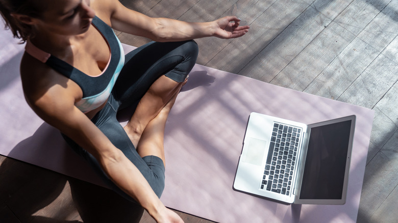 woman laptop yoga