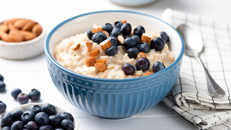Bowl of oatmeal with almonds and blueberries