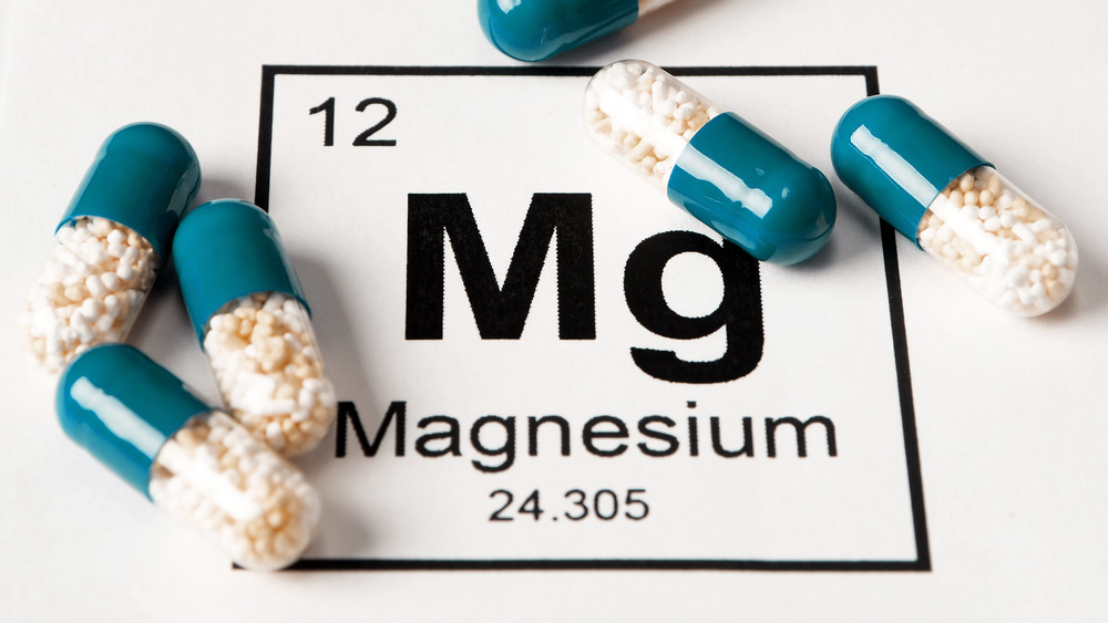 Capsules with chemical symbol for magnesium