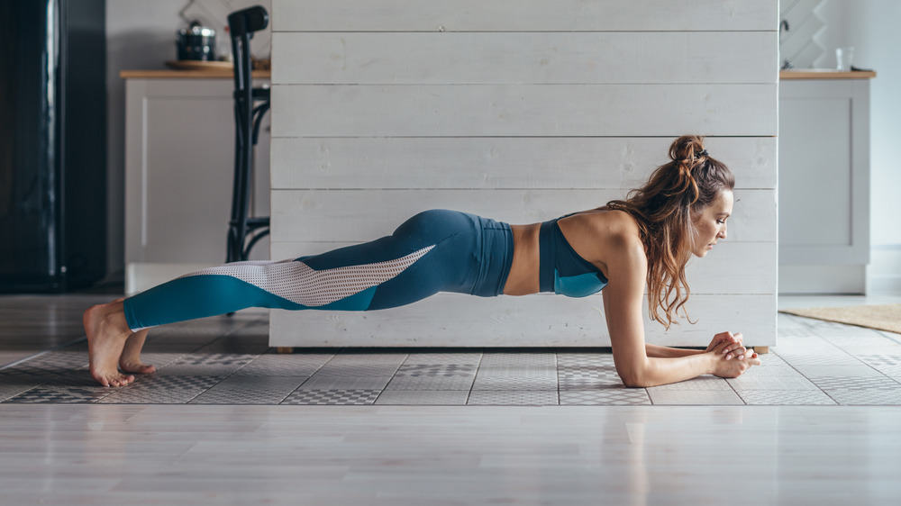 Woman holding plank position