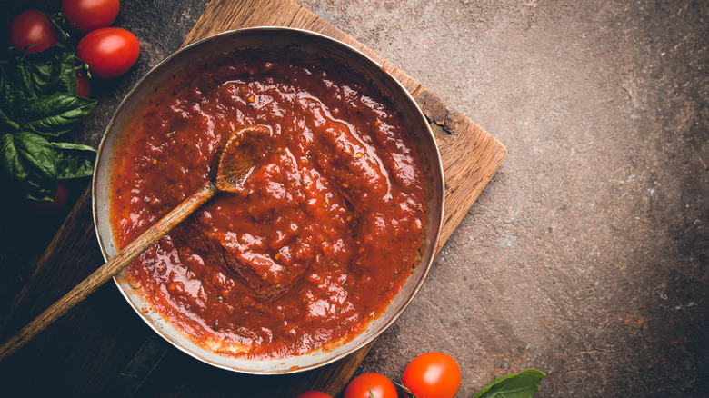A pan full of red pasta sauce