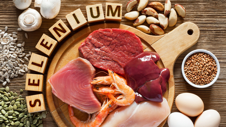selenium rich foods over wooden plate