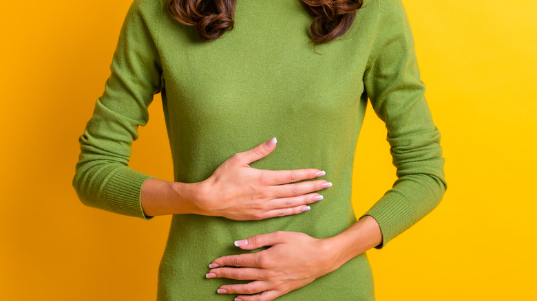woman with stomach discomfort