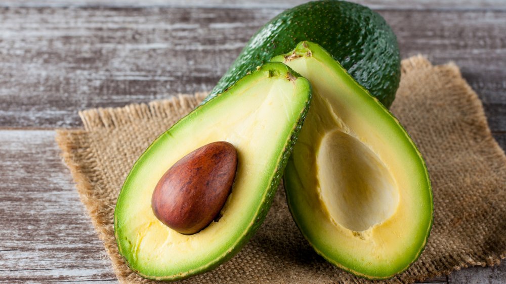 Closeup of an avocado, sliced open