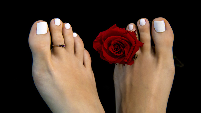 feet with white nail polish and Morton's toe