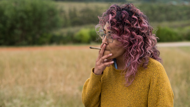 Woman smoking marijuana