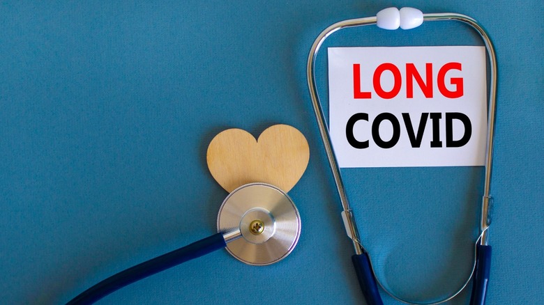stethoscope and heart, "Long COVID" sign