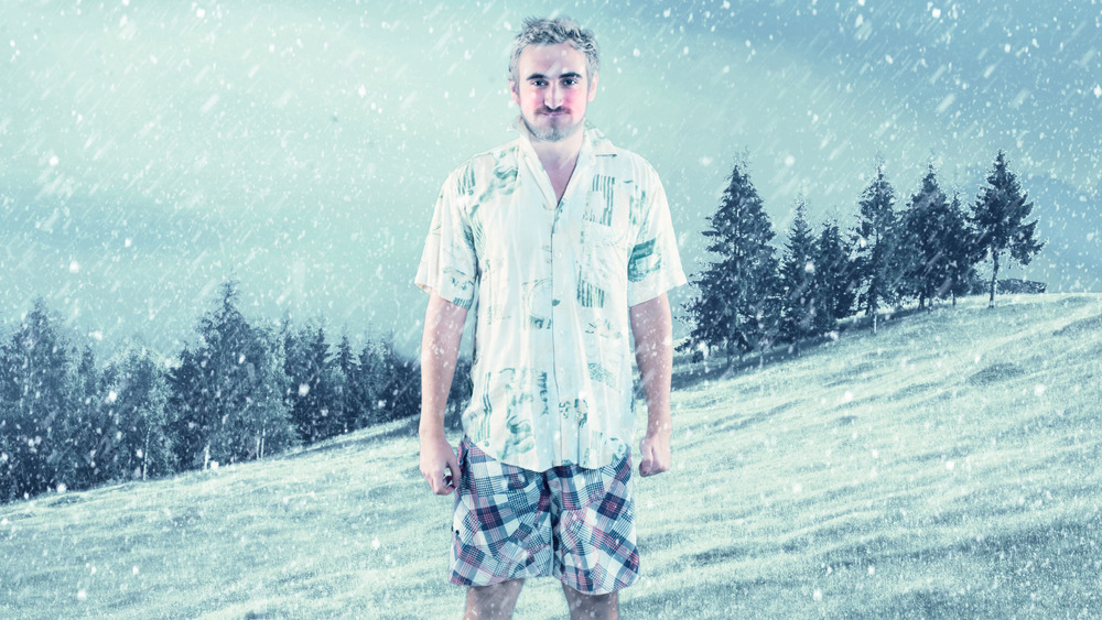 man in shorts in snow