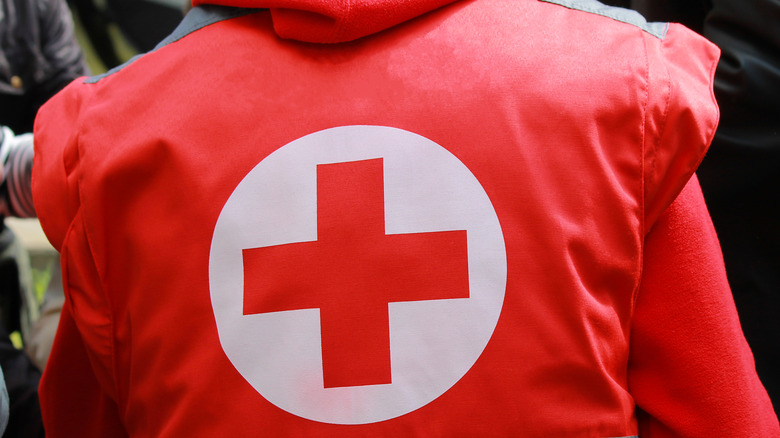 Medical professional wearing American Red Cross uniform